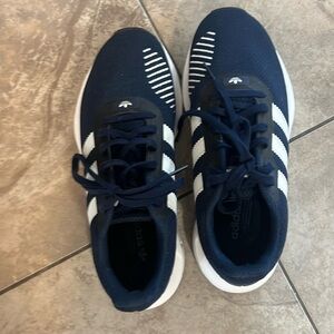 Adidas swift running shoe. Navy w/white youth 6 = women's 7.5. New, never worn